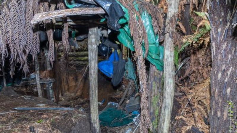 Photos reveal secret bush camp where fugitive father hid his children