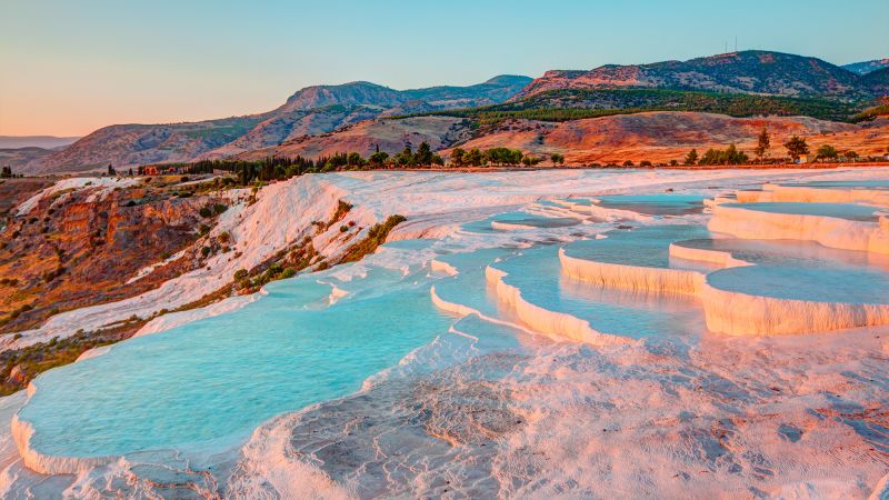 A magical white stone wonderland with effervescent bathing pools