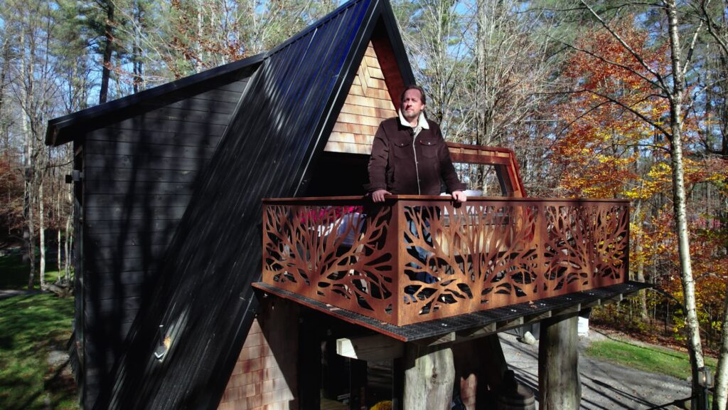 He bought 5 acres of land for $27,000 and built three rental cabins.