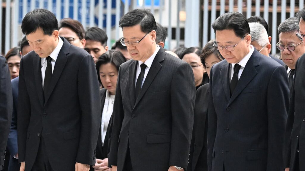 Hong Kong remembers victims of fires that killed more than 128 people