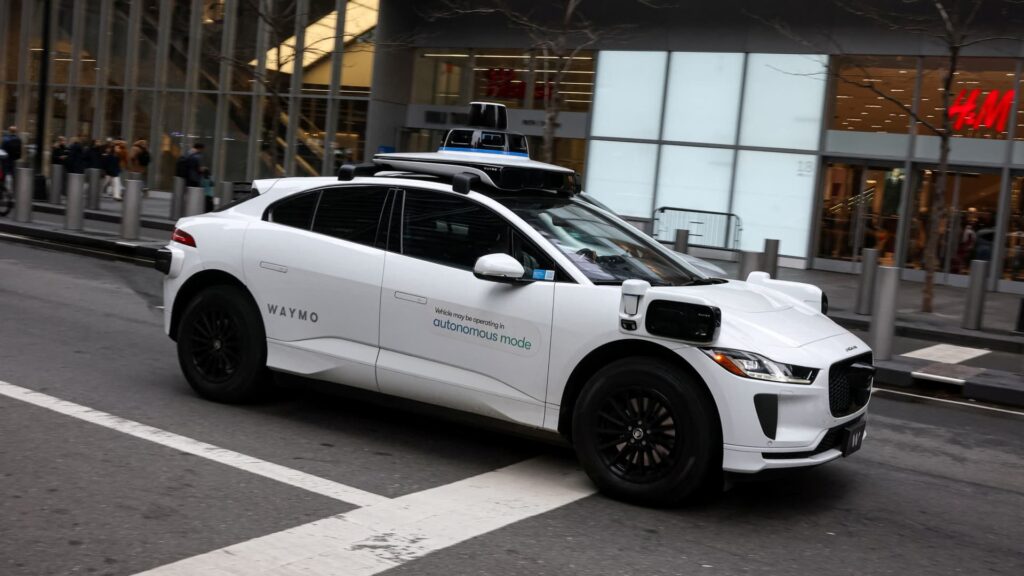 Waymo surpasses 450,000 paid rides per week, widening gap with Tesla