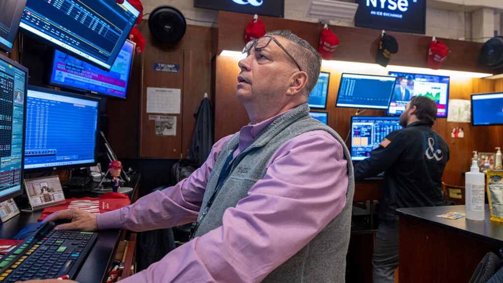 U.S. stocks hit record highs as investors move away from tech industry