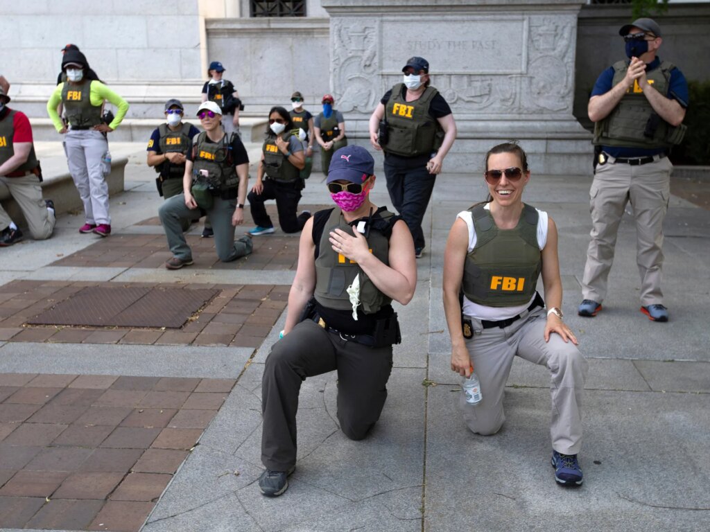 FBI agent claims wrongful termination for kneeling during US protests | Donald Trump News