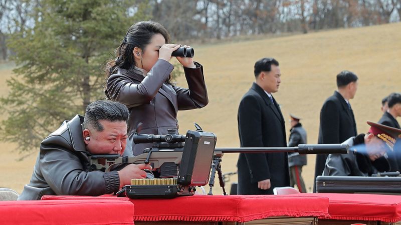 Kim Jong-un uses sniper rifle photo to draw attention to daughter, possible successor