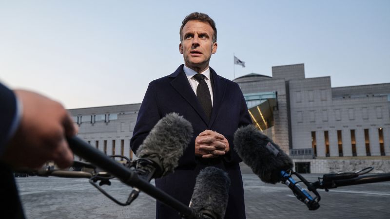 French president hits back at Trump by mocking his wife’s treatment of him