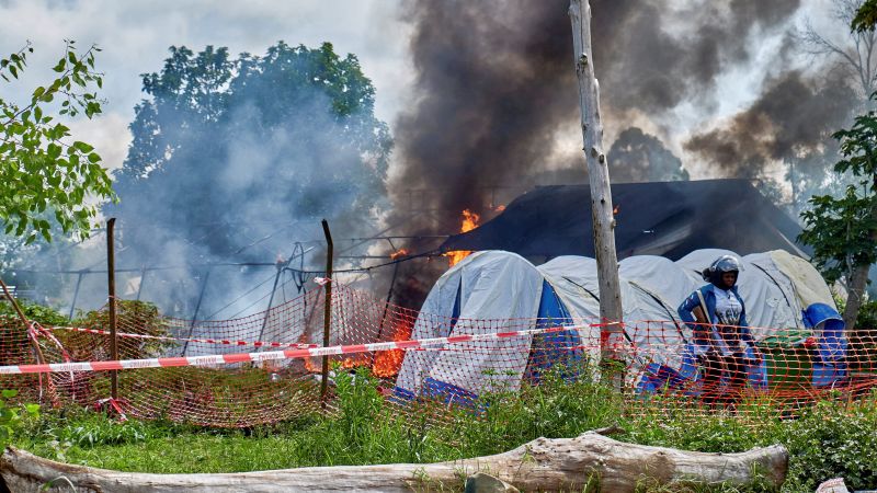 Demonstrators set fire to Ebola treatment center in Democratic Republic of Congo, demanding return of bodies