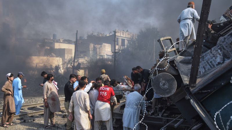 Powerful bomb explodes near railroad tracks in southwestern Pakistan, killing at least 19 people