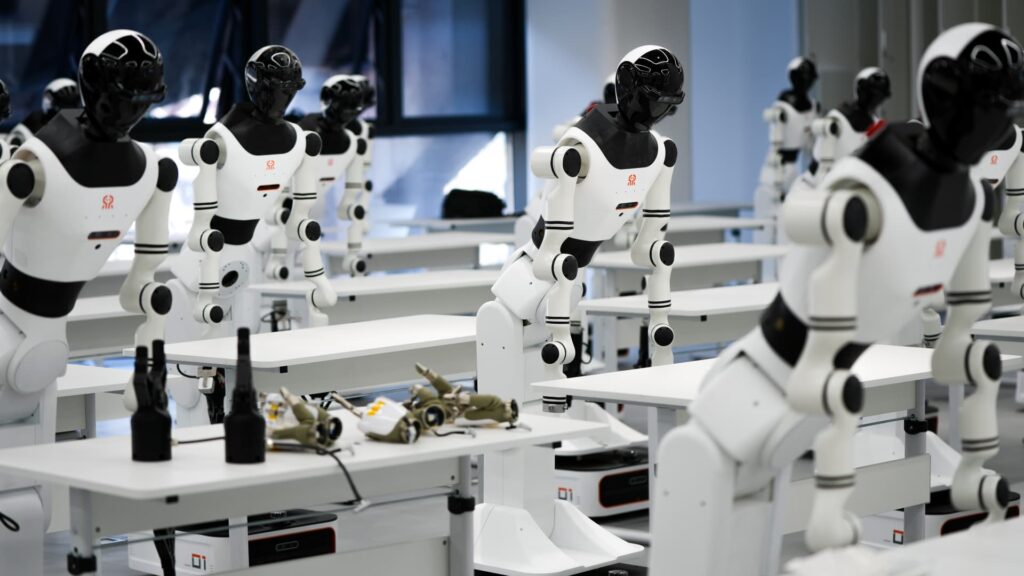 Rivian CEO takes a different approach to humanoid robots than Elon Musk