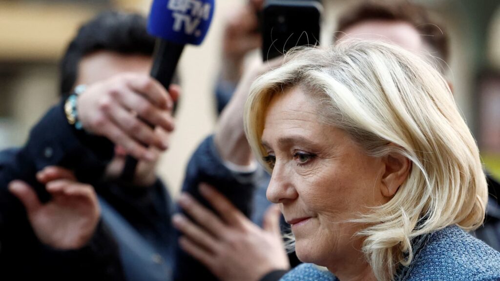 French court clears the way for Marine Le Pen to run for president after wearing ankle tag