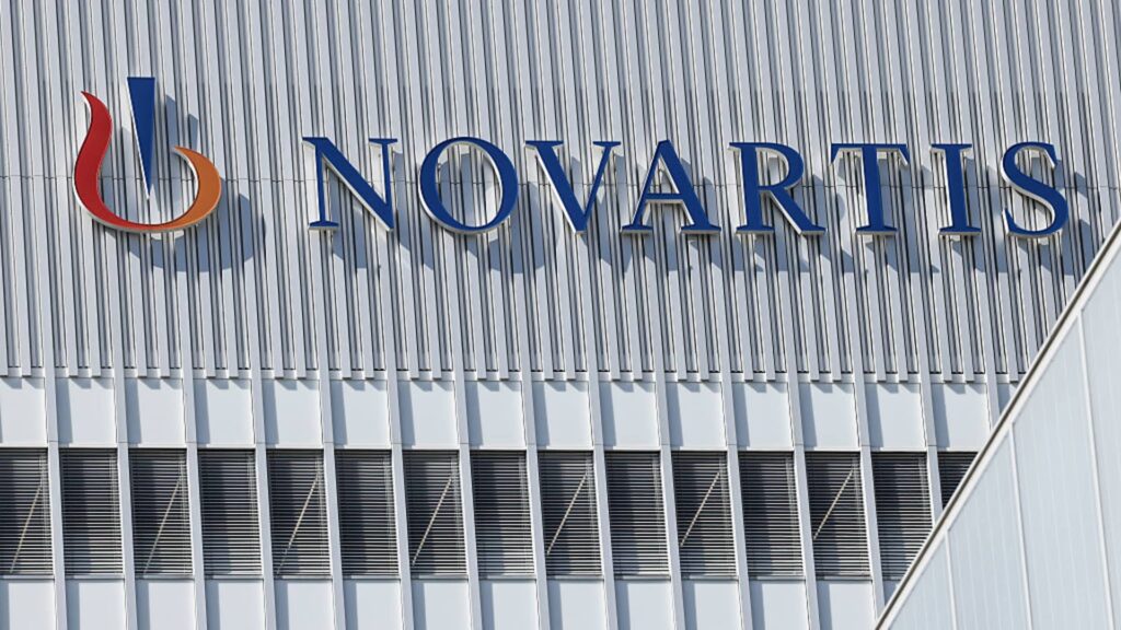 Stocks making the biggest moves pre-market: GM, MMM, NVS, NBIS