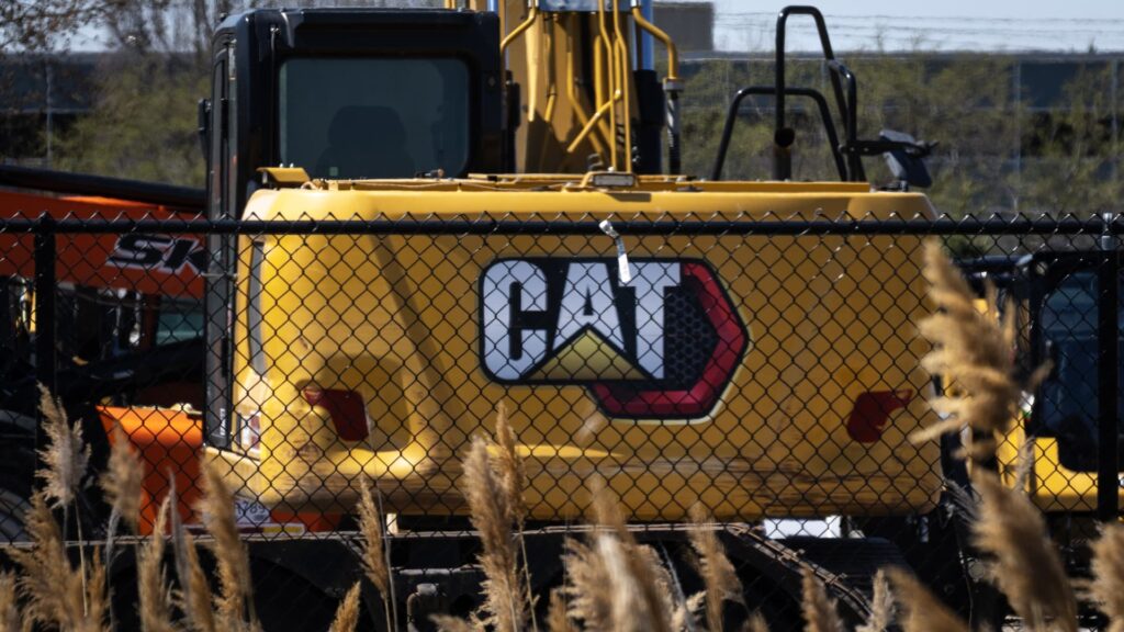 Stocks with the biggest price movements at midday: CAT, VRT, SOFI, AMD