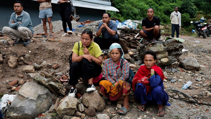 Families in US, UK, Australia and beyond search for missing loved ones after floods in Nepal and China