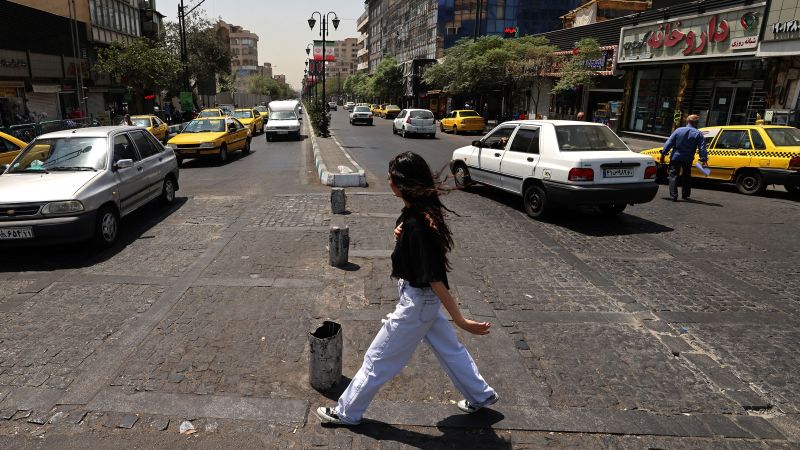 Iranian women resist hardliners’ efforts to force them to wear hijab