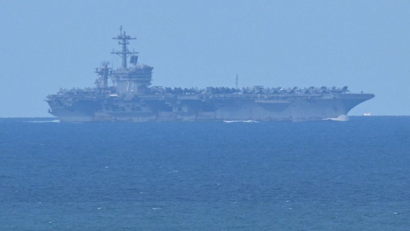 The aircraft carrier Abraham Lincoln arrives in Thailand after months of fighting in the Middle East.