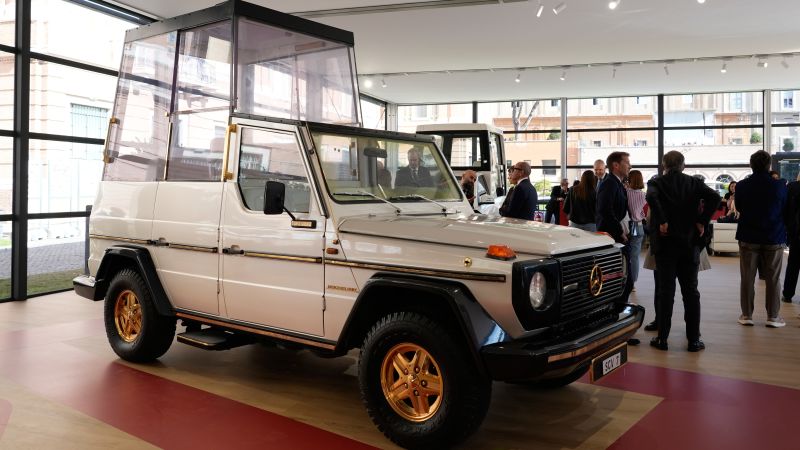The Papal Mobile Exhibition, displaying the vehicles used by the Pope since 1930, opens at the Vatican.